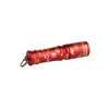 Red LED flashlight with golden Chinese patterns, keychain-ready, white background