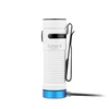 White Baton 3 compact LED flashlight with black pocket clip charging on blue magnetic base, isolated on white background