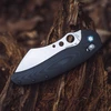 SENTRY RI 14C28N cleaver folding knife, black handle, blue accent, on textured wood.