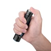 handheld view of Olight Warrior Mini 2 in black