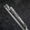 Grey metallic OTRACLE B1 pen, showing its robust clip with engraving and textured end cap.
