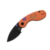 Halloween pocket knife with orange handle featuring jack-o-lantern design, purple buttons, and black blade isolated on white