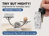 Nextool mini multitool on scale lighter than egg and attached to keychain for portable everyday carry.