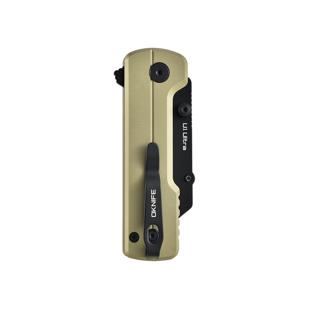 Oknife U1 Ultra folding pocket knife with gold handle and black pocket clip isolated on black background
