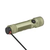 Olight olive green rechargeable tactical flashlight charging via magnetic USB cable isolated on white background