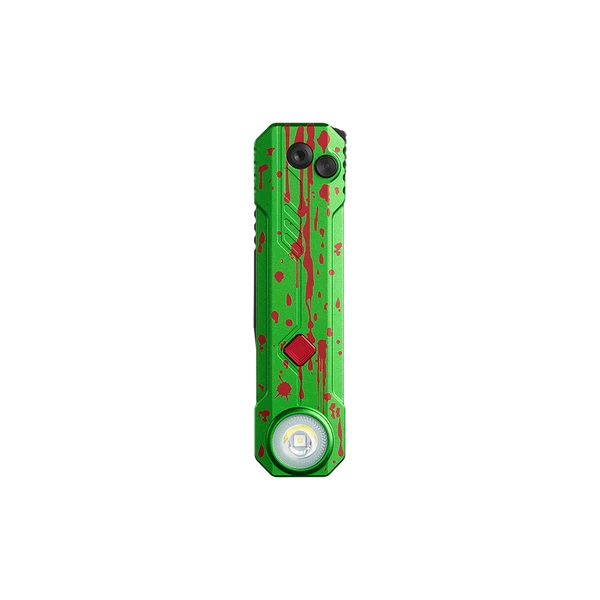 Green EDC flat flashlight with red splatter paint design and LED bulb isolated on black background