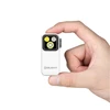 Olight White Oclip Pro held in hand with bright LED lights for everyday carry and utility