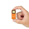 Handheld view of Oclip in Orange