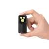 Olight Black Oclip 2 Ultra Mini Clip Light Held in Hand Showing Compact Dual-Light Design for EDC and Outdoor Use