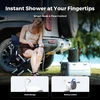 Woman using a portable outdoor camp shower with smart hook and flow control rotary switch by her vehicle at the beach