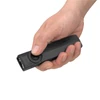 Olight Black ArkPro Flat EDC Flashlight Held in Hand Showing Laser and UV Selector Switch for Everyday Carry