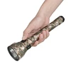 Olight Javelot Turbo 2 Camouflage held in hand, digital camo for hunting, search and rescue.
