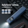 Olight Blue Arkfeld Ultra flashlight with 1400 lumens on a keyboard for everyday carry and task illumination