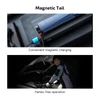 Olight Blue Arkfeld Ultra flashlight charging with magnetic tailcap for hands-free use in automotive repair.