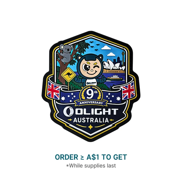 Olight Australia 9th anniversary commemorative patch featuring a cartoon mascot, koala, and Sydney Opera House.