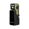 Olight green clip-on flashlight with black charging dock and digital battery indicator isolated on white background