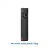 Olight black flat EDC flashlight with selector dial and USB charging port isolated on white background
