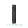 Olight black flat EDC flashlight with selector dial and USB charging port isolated on white background