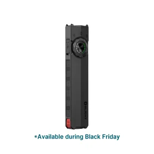 Olight black flat EDC flashlight with selector dial and USB charging port isolated on white background