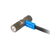 Olight mini keychain flashlight charging with a blue magnetic USB cable on a white background.
