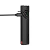 Olight black flat EDC flashlight with USB-C charging cable connected on white background