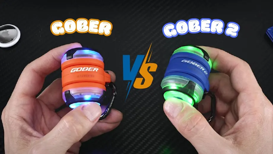 Gober vs Gober 2 handheld safety lights comparison: orange with blue, blue with green.