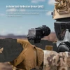EOTech holographic sight with honeycomb anti-reflective device mounted on rifle held by soldier wearing gas mask
