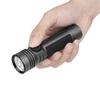 Olight Black Seeker 4 Pro Flashlight Handheld Close-up with Textured Grip and Rotary Switch for Outdoor Search and Rescue