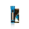 Olight Blue Seeker 4 Pro Flashlight Side View with an illuminated beam in a wooden box, ideal for various lighting needs