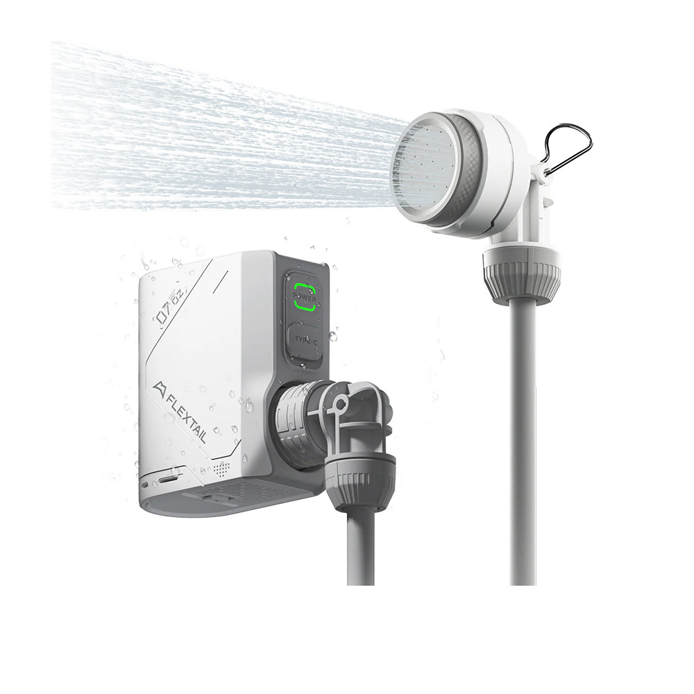 Flextail portable camp shower system showing rechargeable water pump and spraying shower head on white background
